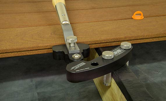 Straightening terrace plank using Hardwood Wrench™